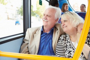 Senior Couple Enjoying Journey On Bus